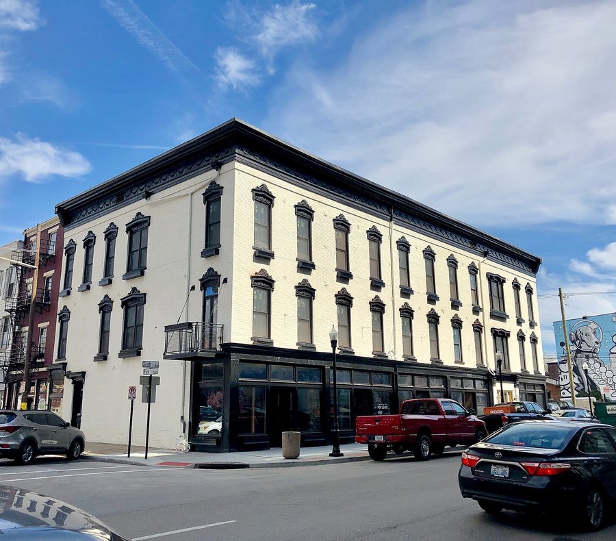 Historic brick Italianate homes on a Covington street